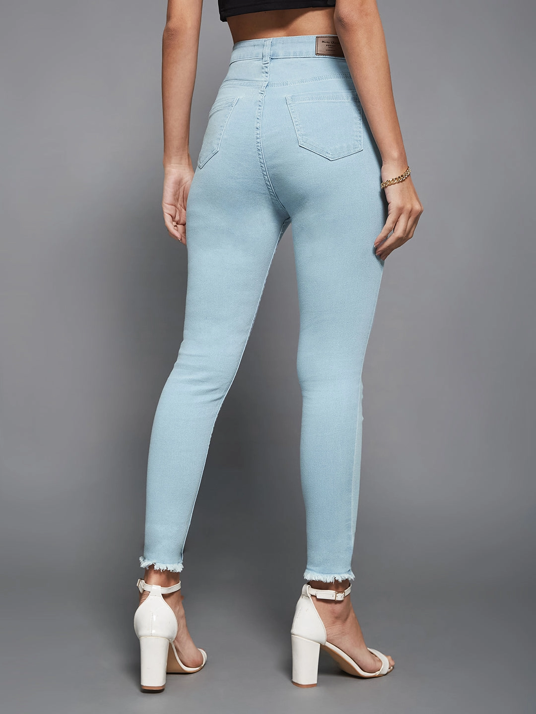 Earthy Soft 24/7 Comfort Light Blue Skinny High-Rise Fringed Hemline Cropped Acid Wash Solid Stretchable Denim Jeans