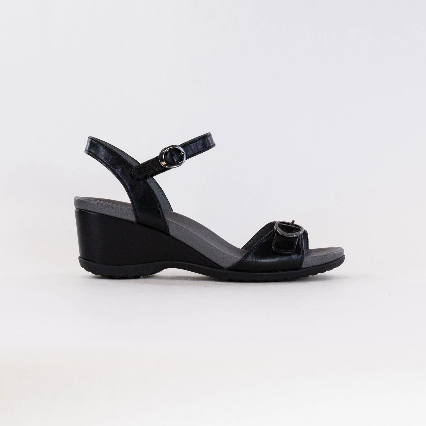 Dansko Arielle (Women's) - Black Glazed Kid Leather Stacked Traction Lugs Windy day