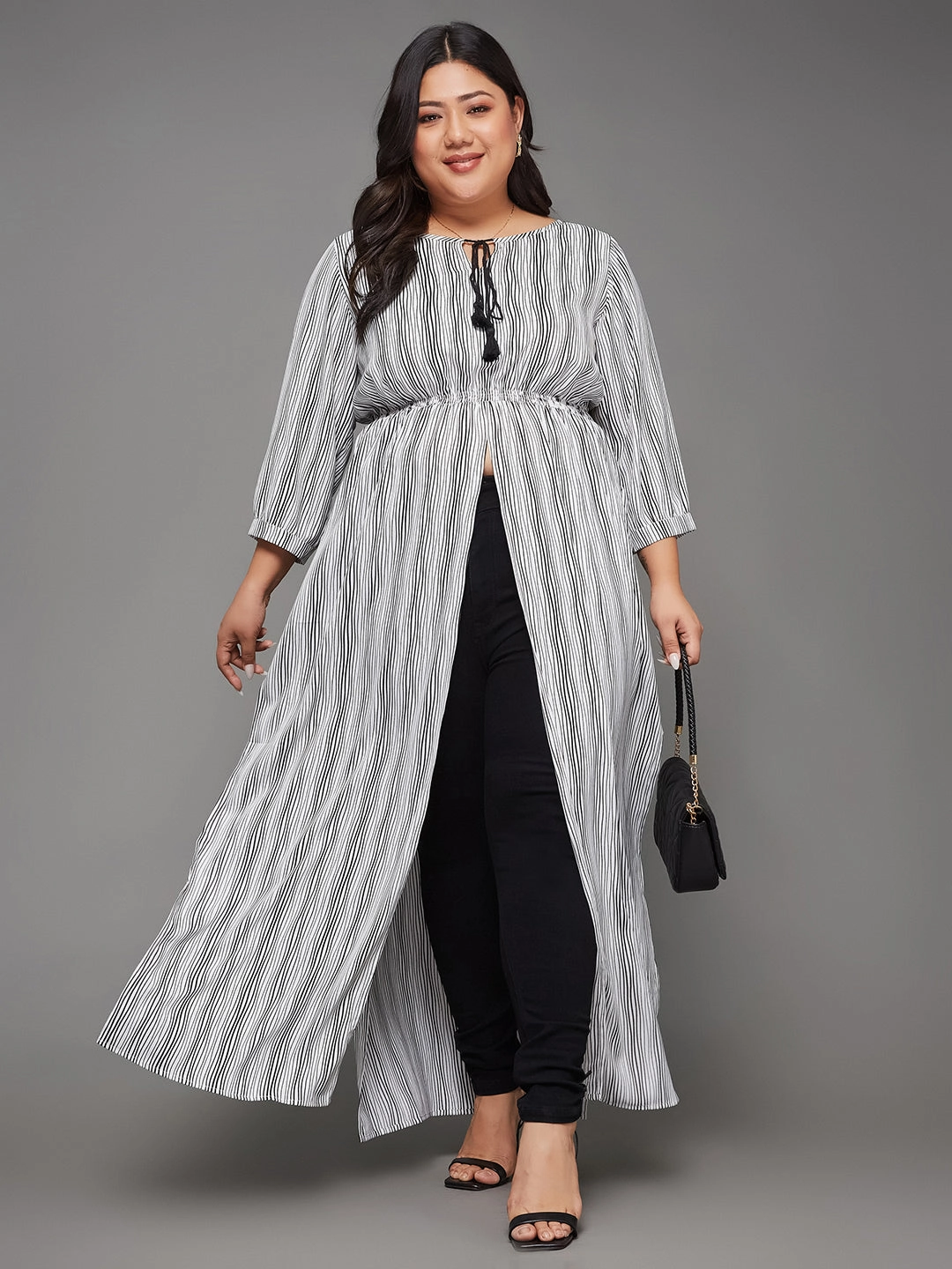 Layered Ply Construction Body Bliss Black & White Striped Tassel Maxi Top