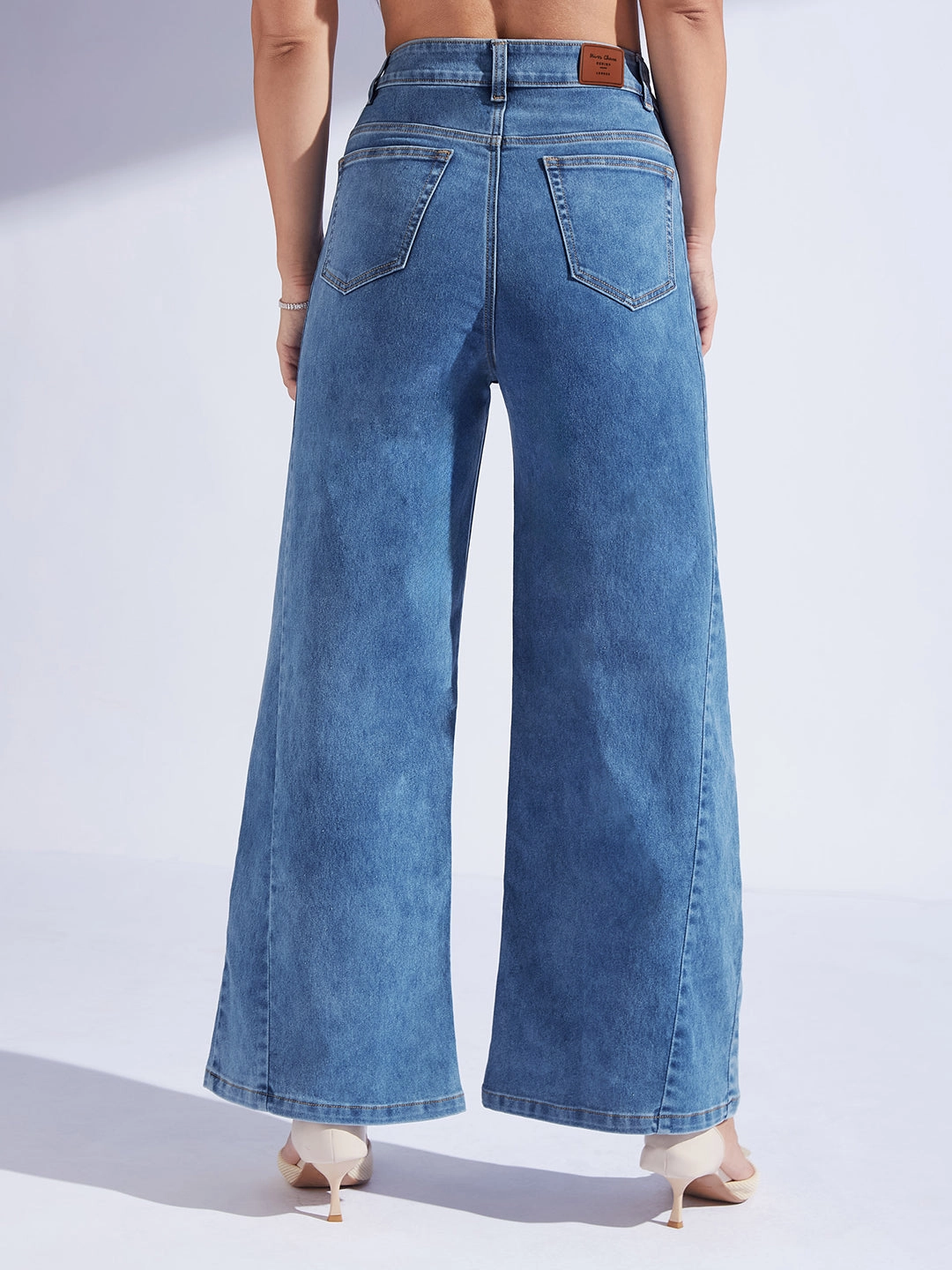 Women's Mid Blue Wide Leg High-Rise Curved Panel Stretchable Denim Jeans Modern Casual