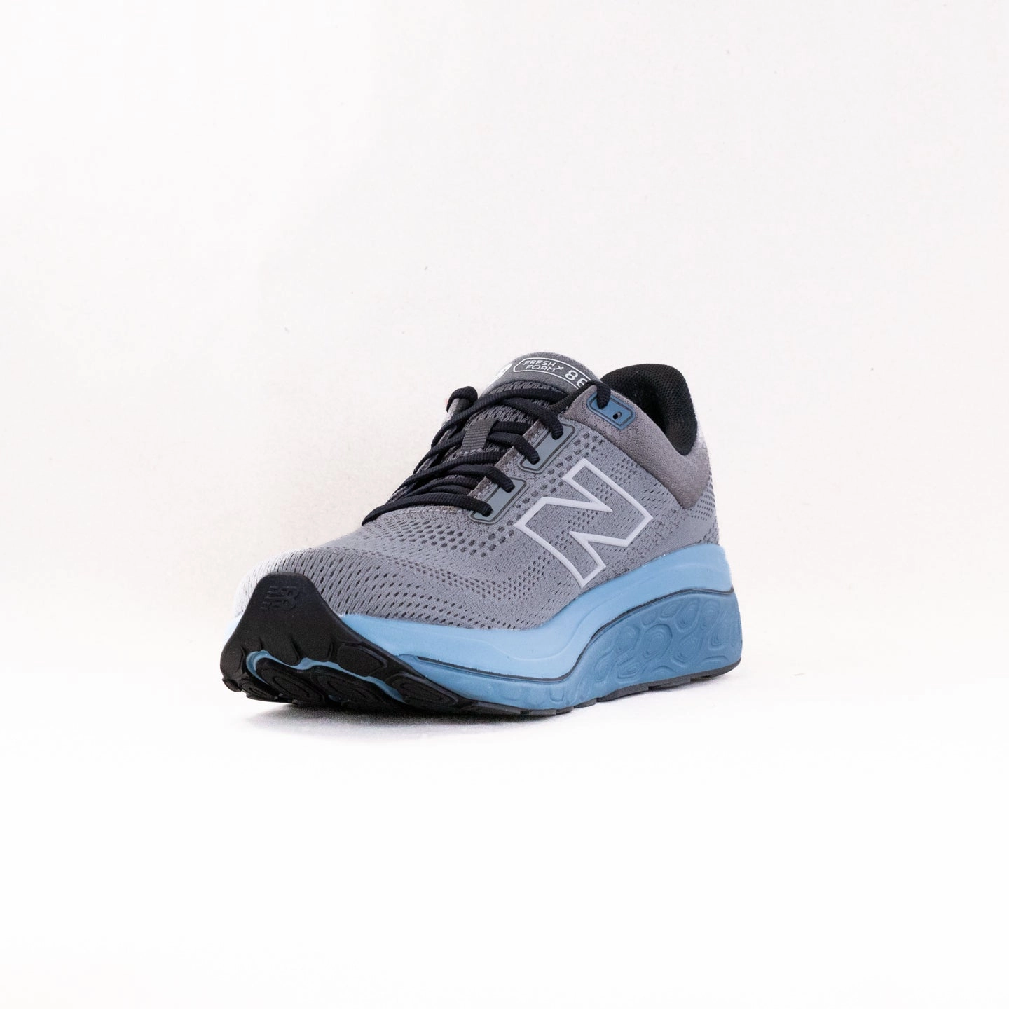 running with a headlamp pin - decorated running shoes New Balance 860V14 (Men's) - Grey/Blue