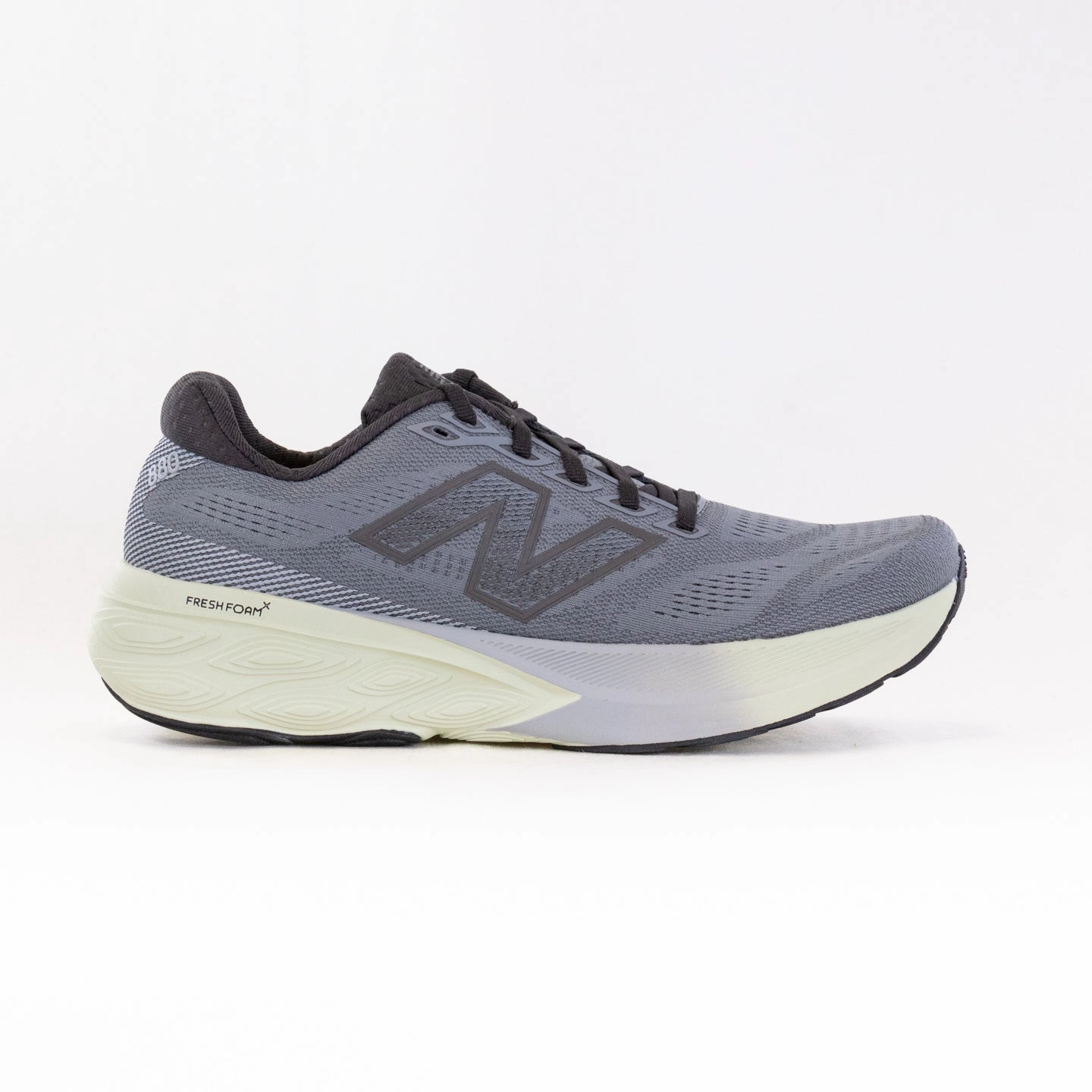 New Balance Fresh Foam X 880V15 (Men's) - Grey running on a wooden track shoes