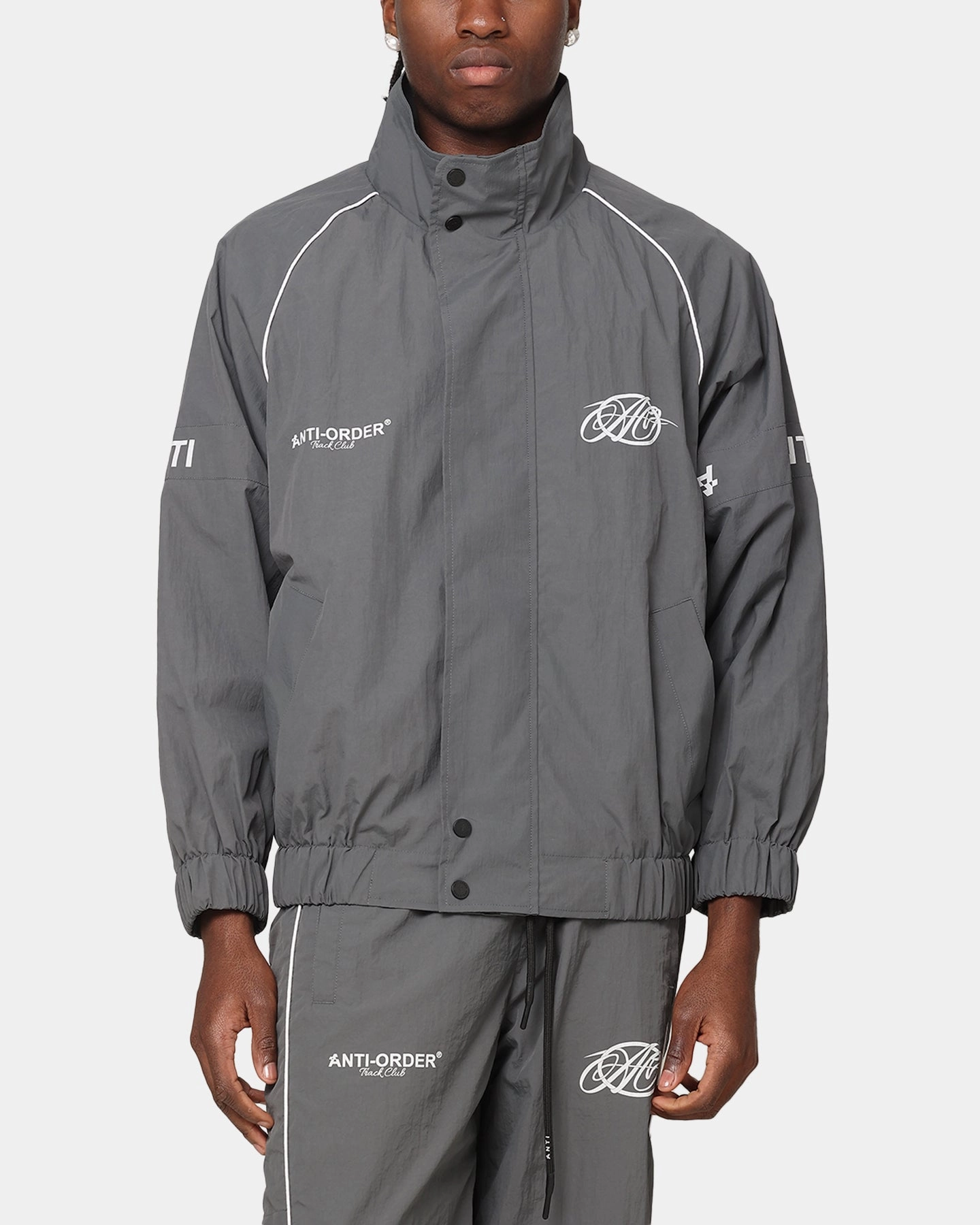 Day To Day The Anti Order Track Club Windbreaker Jacket Dark Grey/Grey