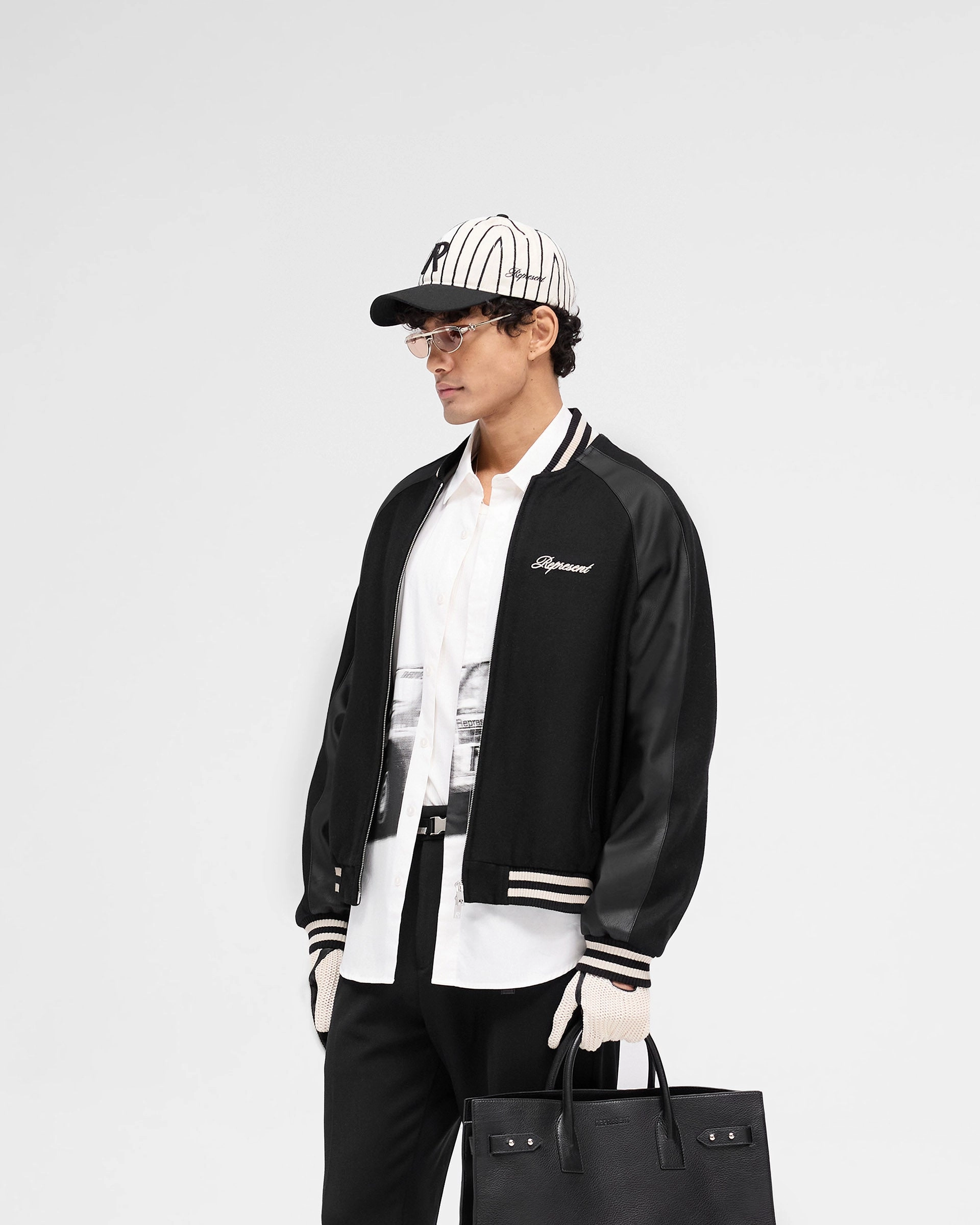 Raglan Varsity Jacket - Black FleeceLined RubberizedButtonClosures