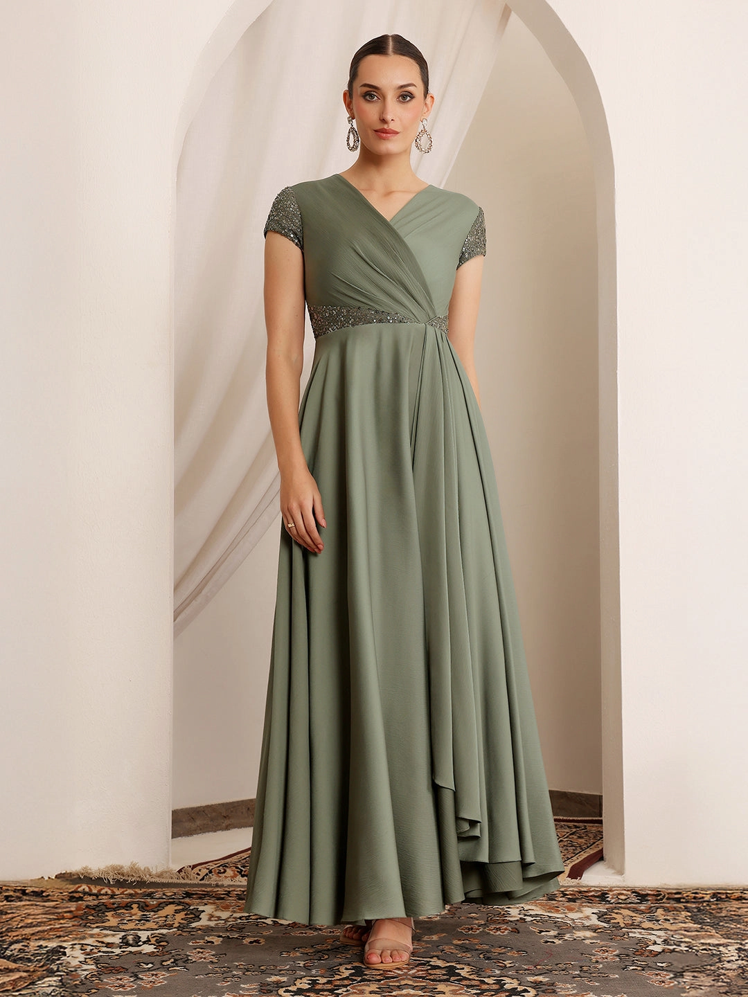 Women's Embellished Pale Olive Gown in Asymmetric Draped Premium Satin Outdoor Scene