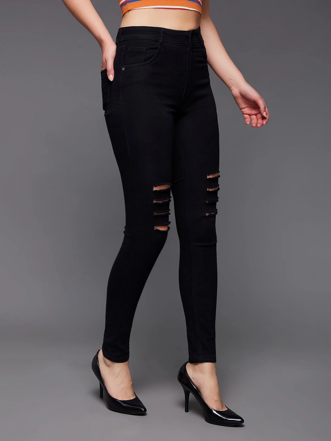 Winter Warmth Minimalist Women's Black Slim-Fit High-Rise Mild-Distressed Ripped Denim Stretchable Jeans