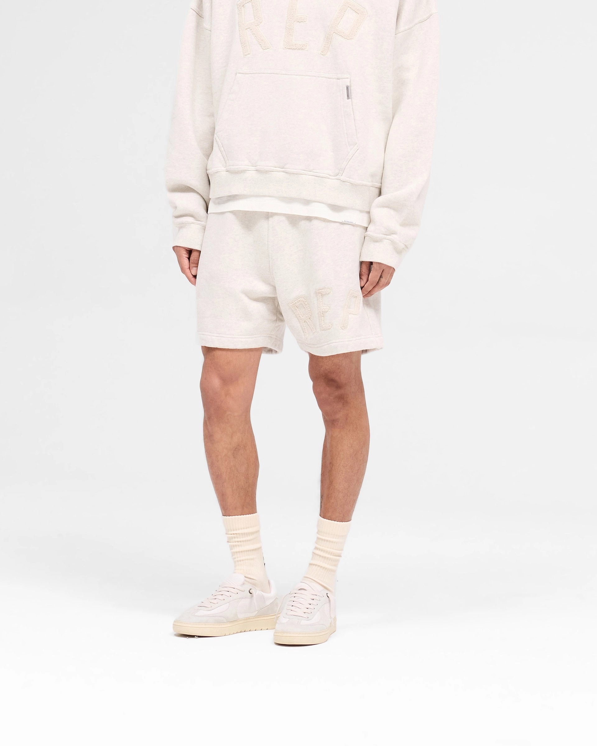 Laser Cut Edges Chill Fit Rep Applique Shorts - Cream Marl
