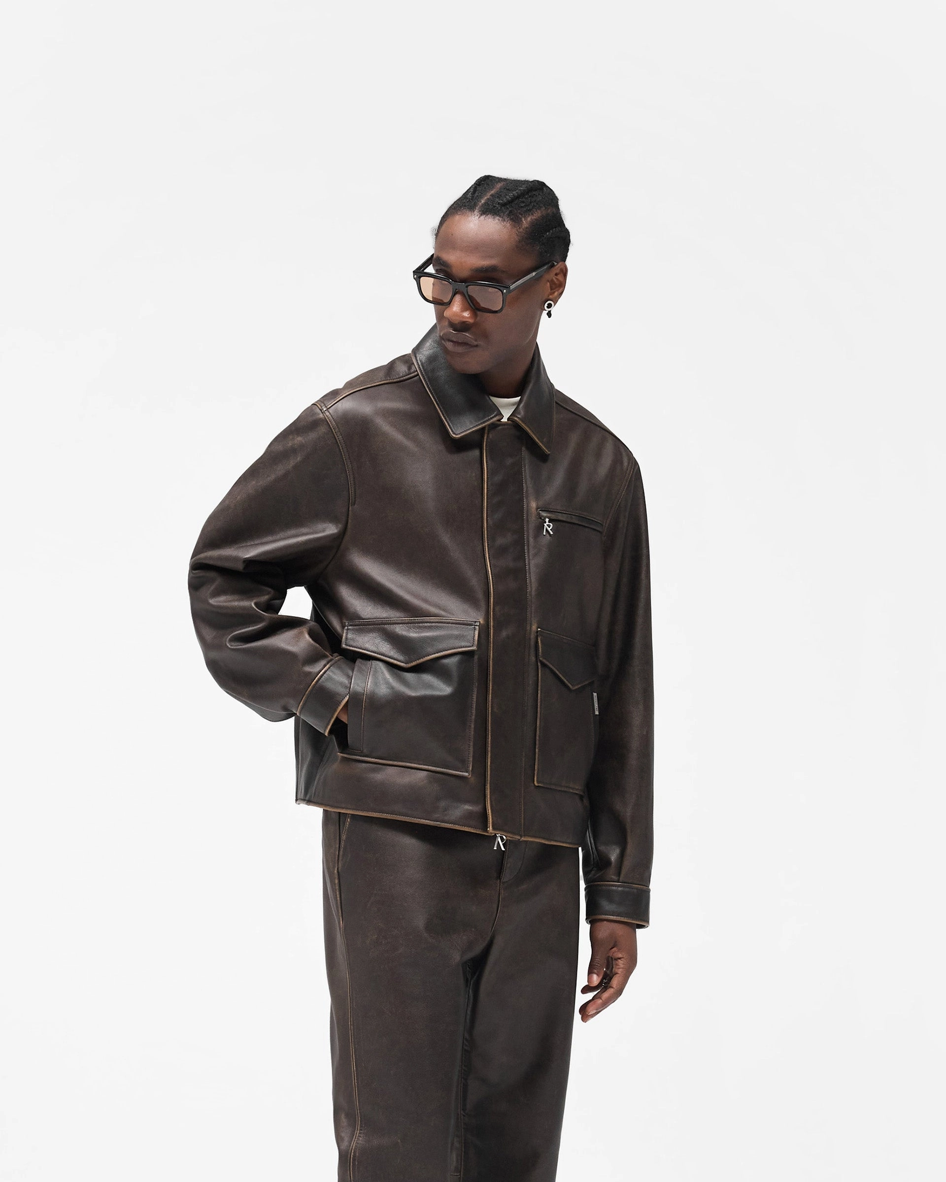 Sunfade Leather Jacket - Nero Adjustable hood design