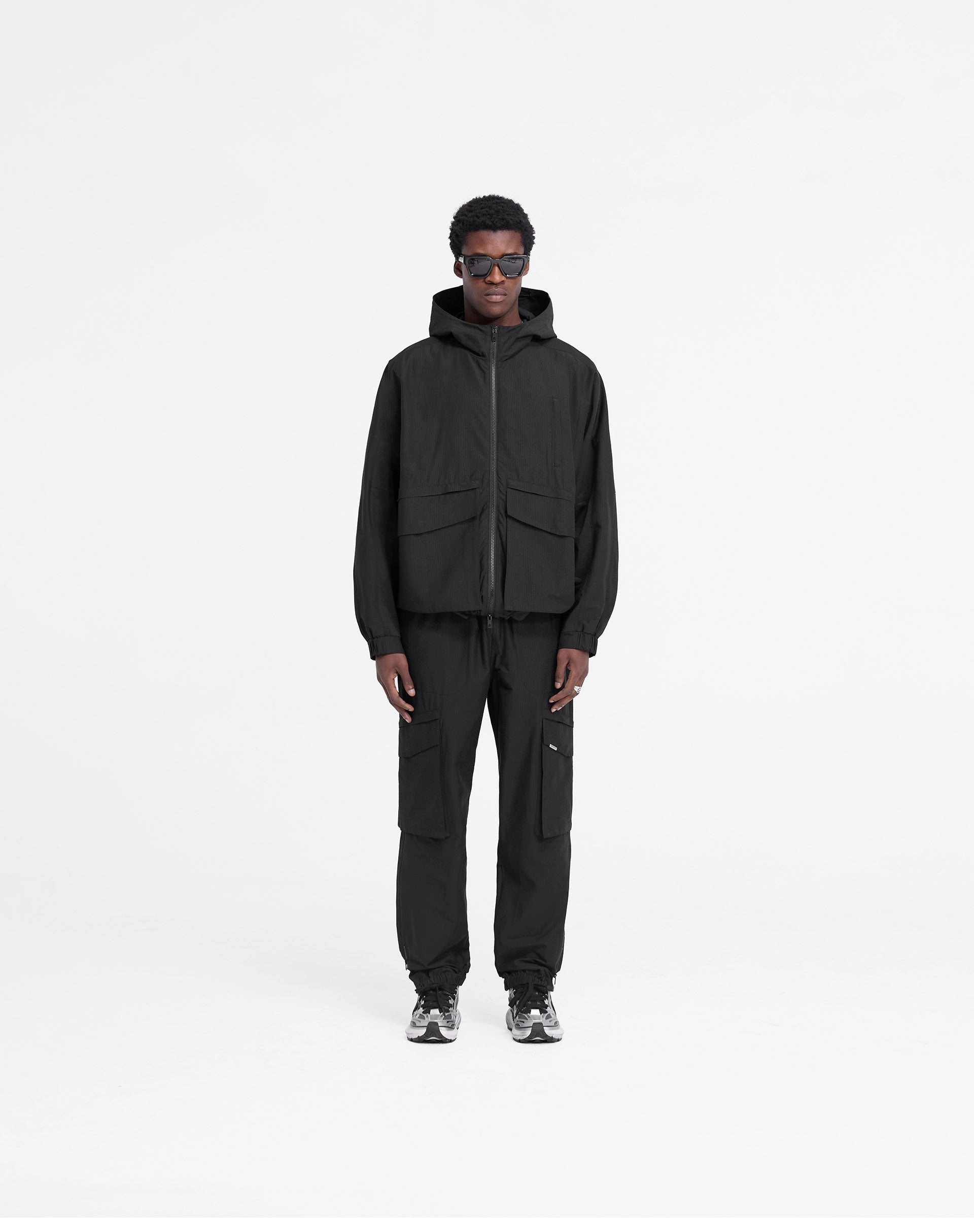 Minimalist Pocket Layout Effortless Travel Wear Tech Cargo Jacket - Jet Black