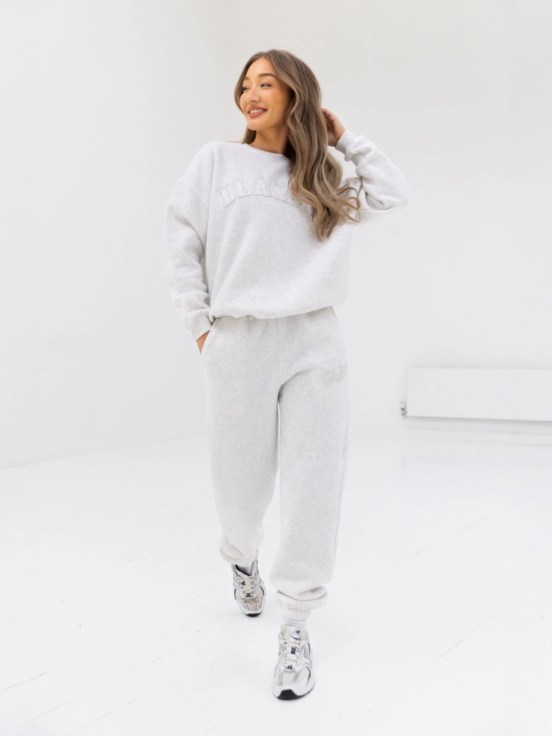 ShrinkageResistant Weave LowImpact Processing Tonal Varsity Oversized Sweater - Marl White
