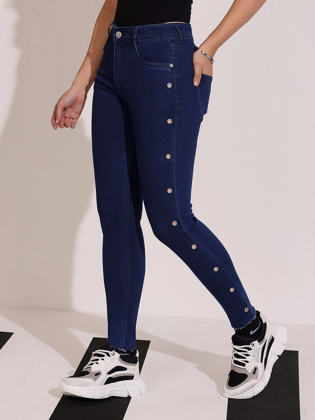 Versatile Look Flexible Style Women's Navy Blue Skinny Fit Mid Rise Cropped Length Eyelet Detailing Denim Stretchable Jeans