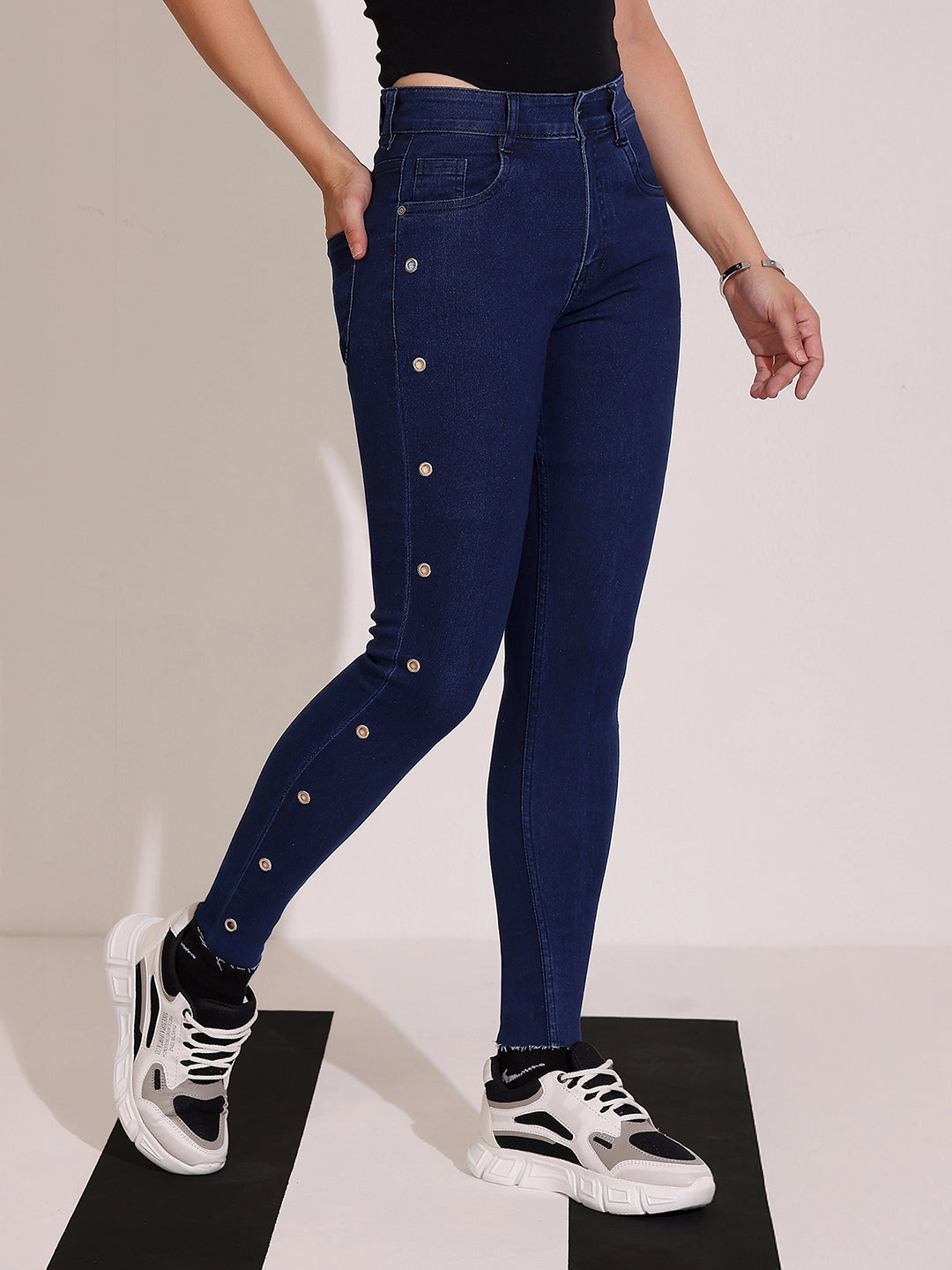 Evening Stroll Athlete Fit Trendy Choice Women's Navy Blue Skinny Fit Mid Rise Cropped Length Eyelet Detailing Denim Stretchable Jeans